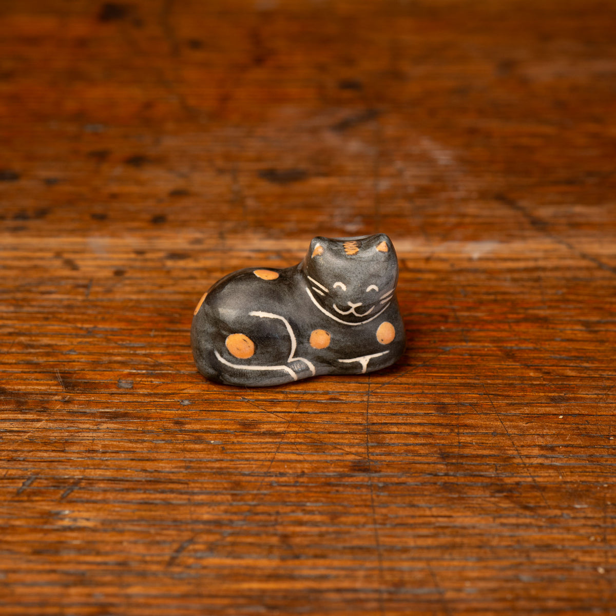 Black & Orange Spot Cat Crèche Piece